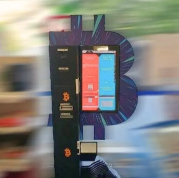 Bitcoin ATM at Rue Louis-Favre 17 in Geneva with a purple Bitcoin backdrop.