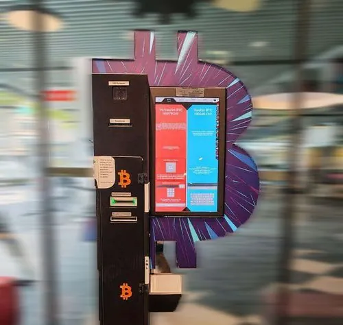 Bitcoin ATM at Badenerstrasse 230 in Zurich with a purple Bitcoin symbol.